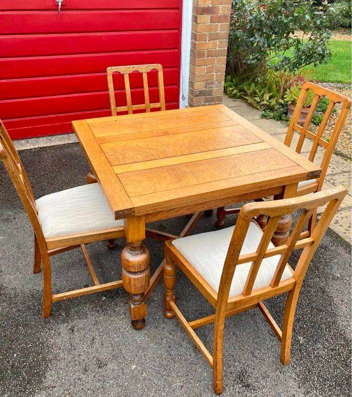 Wooden dining table with 4 chairs for £90