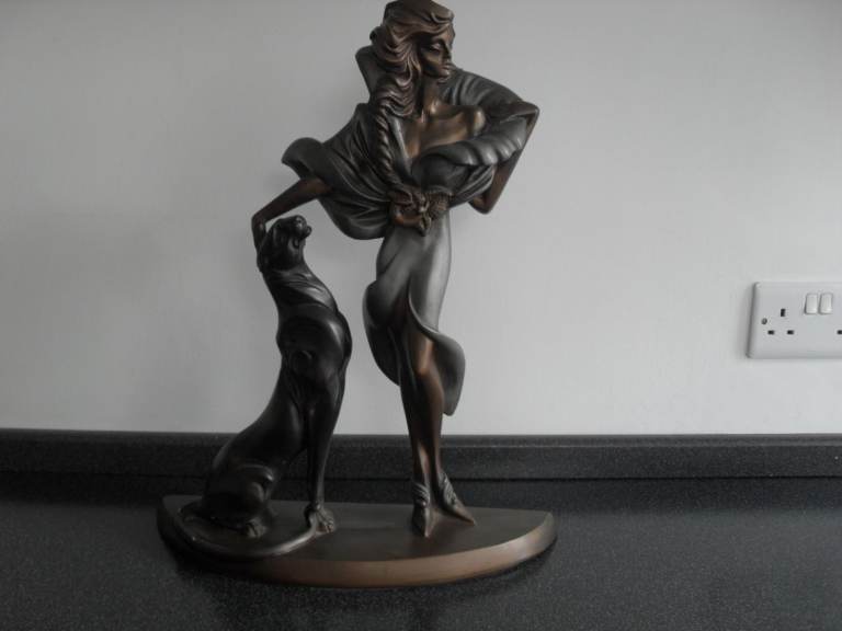 Austin Sculpture lady and dog in quite good condition.