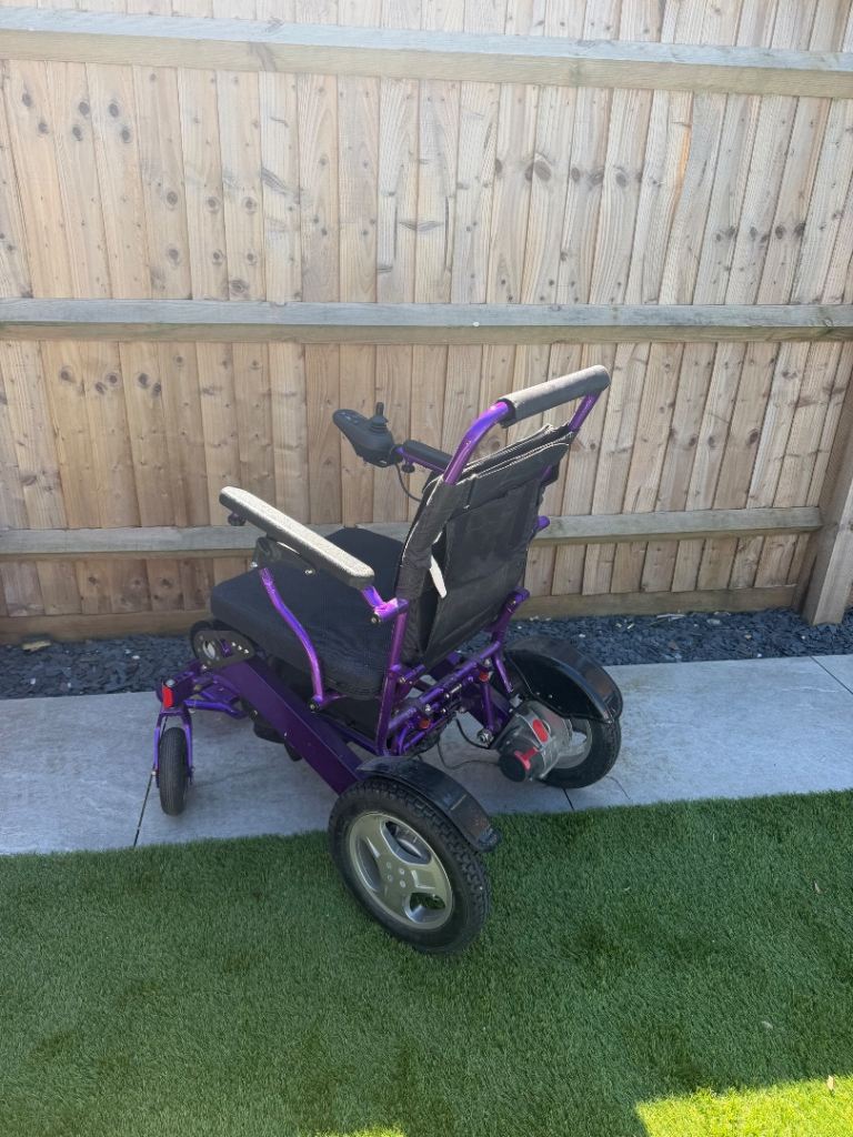 Purple lightweight compact mobility scooter 