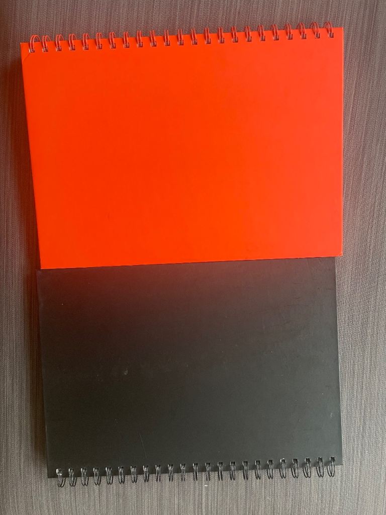 Two hardcover notebooks 