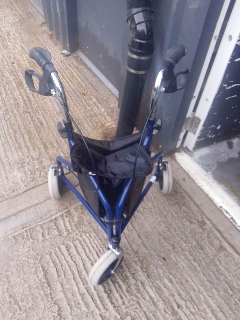 Blue Mobility Walker with Seat and Storage Bag – Good Condition