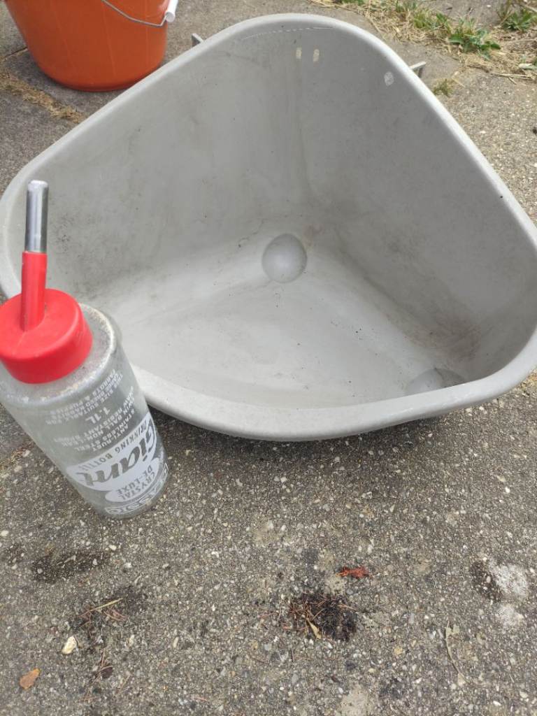 Rabbit litter box and giant drinking bottle