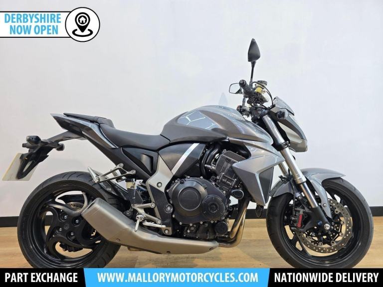 Honda CB1000R Silver 2009 - HISS, R&G Crash Bungs, R&G Radiator Guard