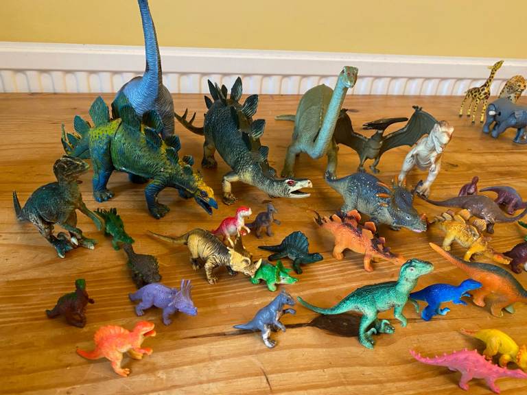 Dinosaurs and exotic wild animal toy figures