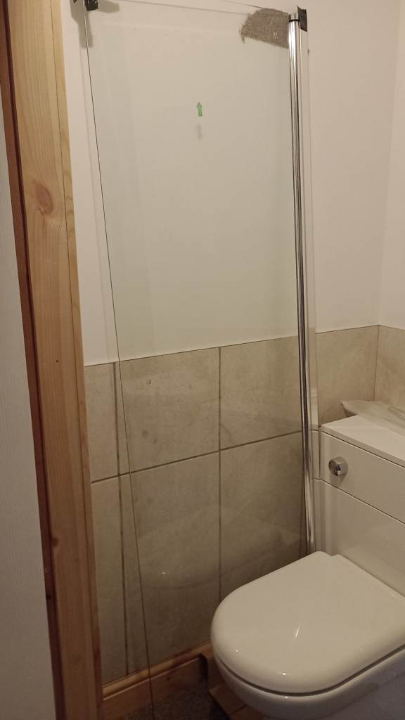 Unused shower screen.