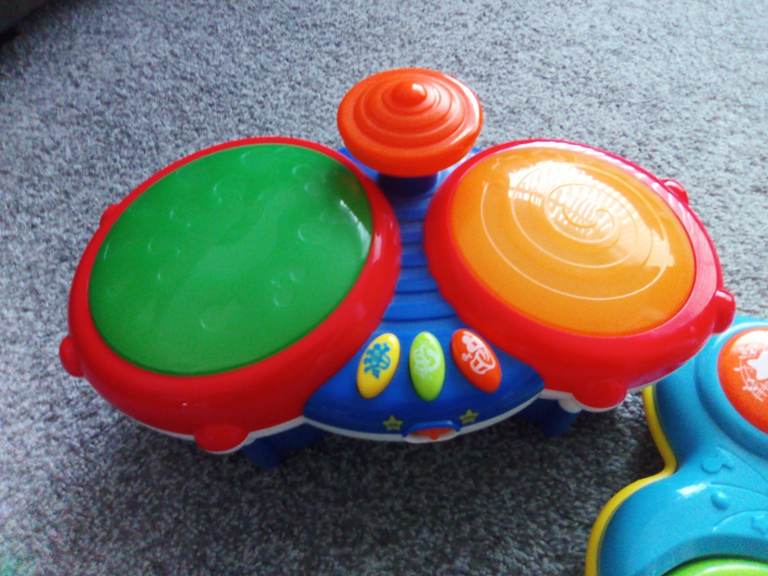2 toy instruments 