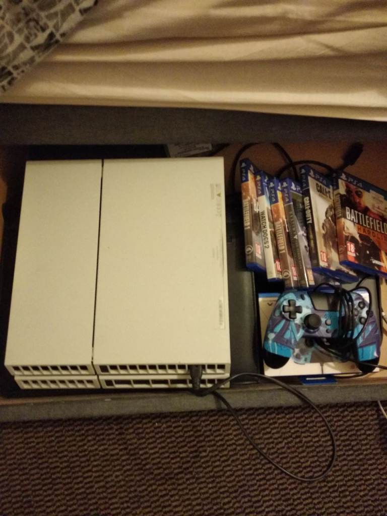 White PS4 Console & Official Controller with Games, As New