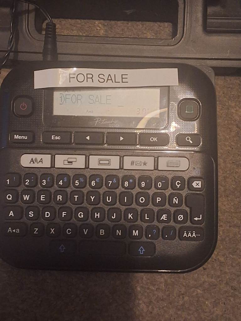 Brother PT-D210 Label Maker and labels
