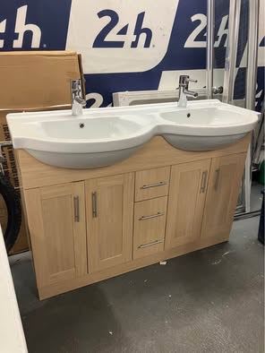 His and hers bathroom sinks with hansgrohe taps, vanity unit and mirror