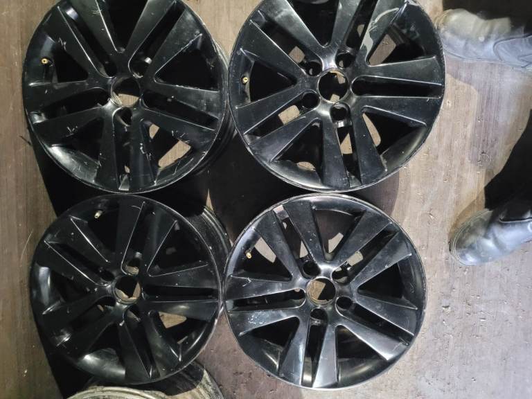 4x black 16inch 5 stud alloys was told they fit saab but not sure