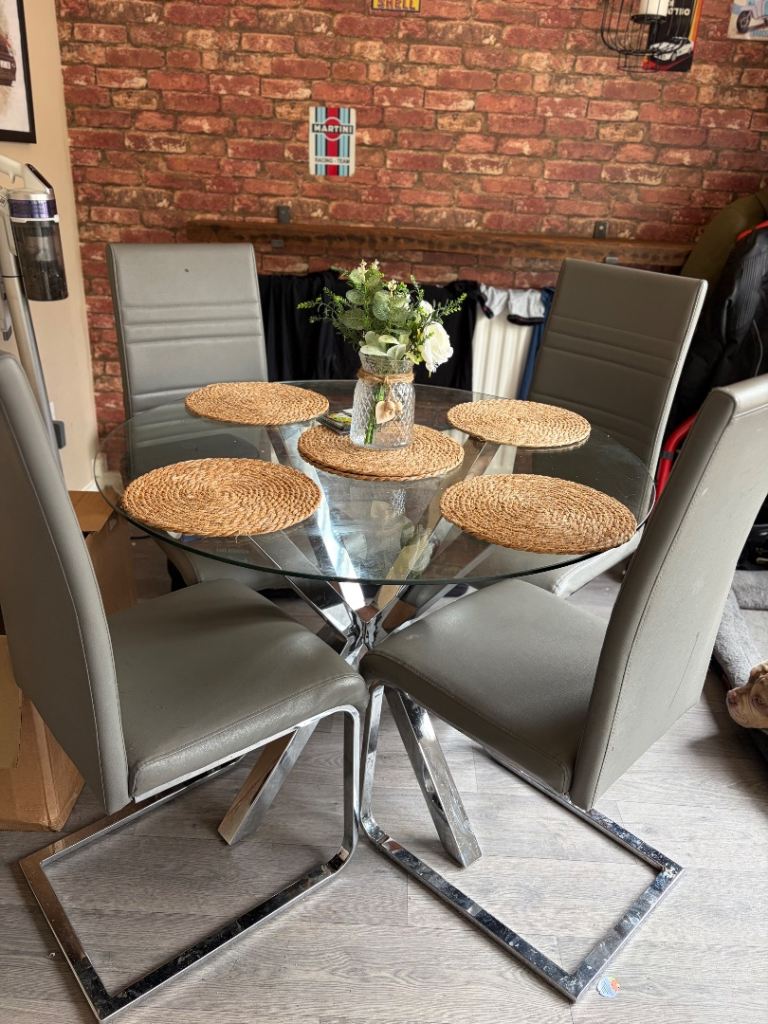 Glass Dining Table with 4 Grey Chairs – Good Condition