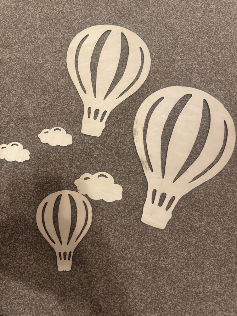 Wooden balloons and clouds - nursery room decoration