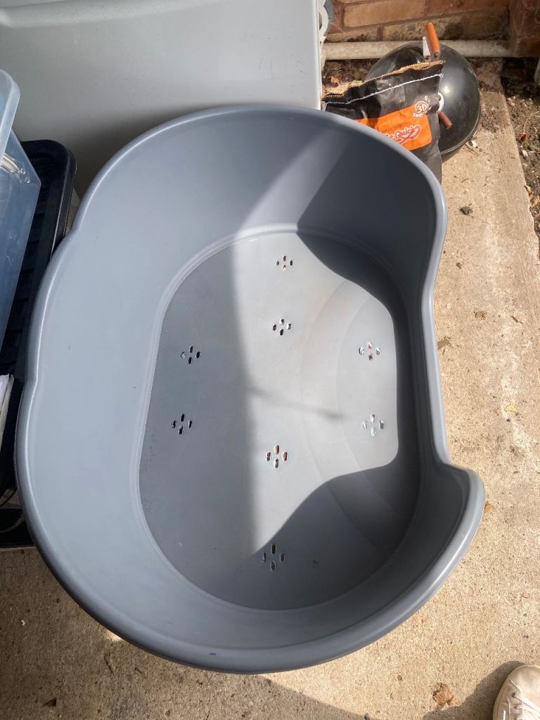 Large plastic dog bed