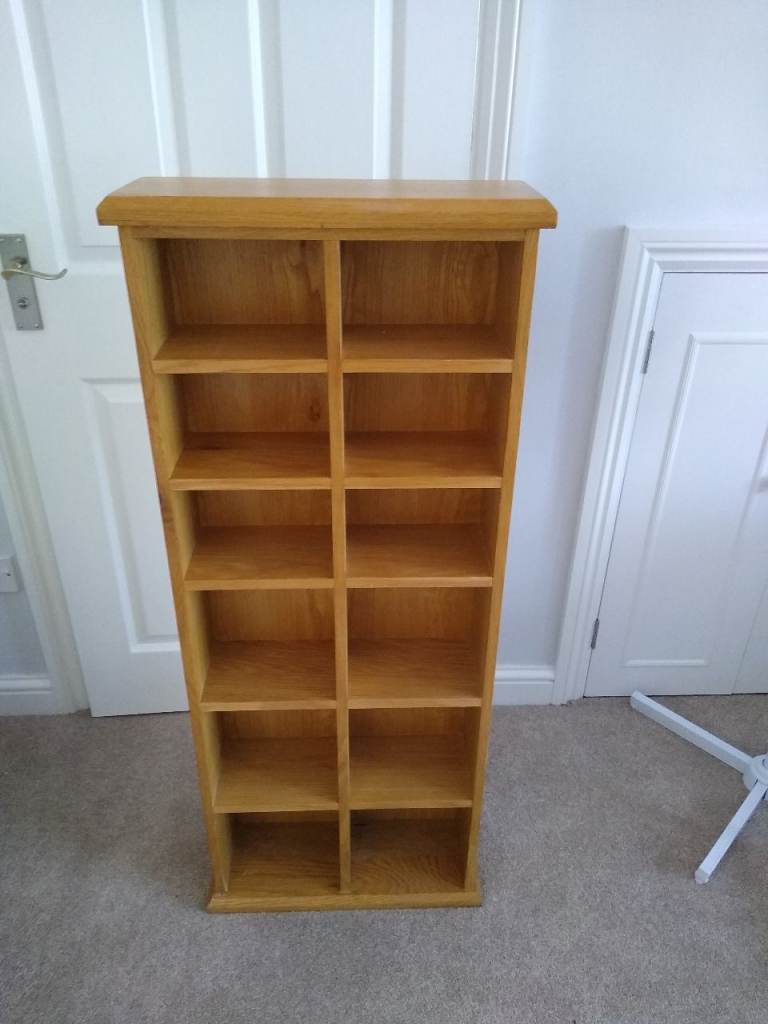 Two tall CD/DVD/gaming ornament unit