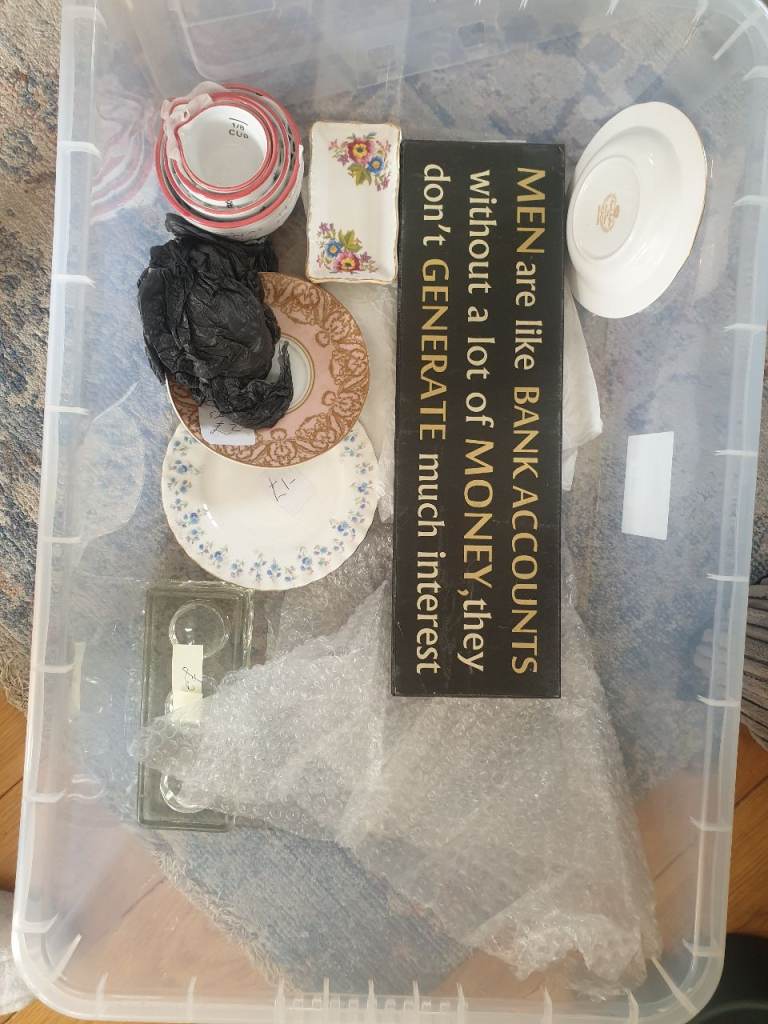 Large Clear Plastic Storage Box with Various Items