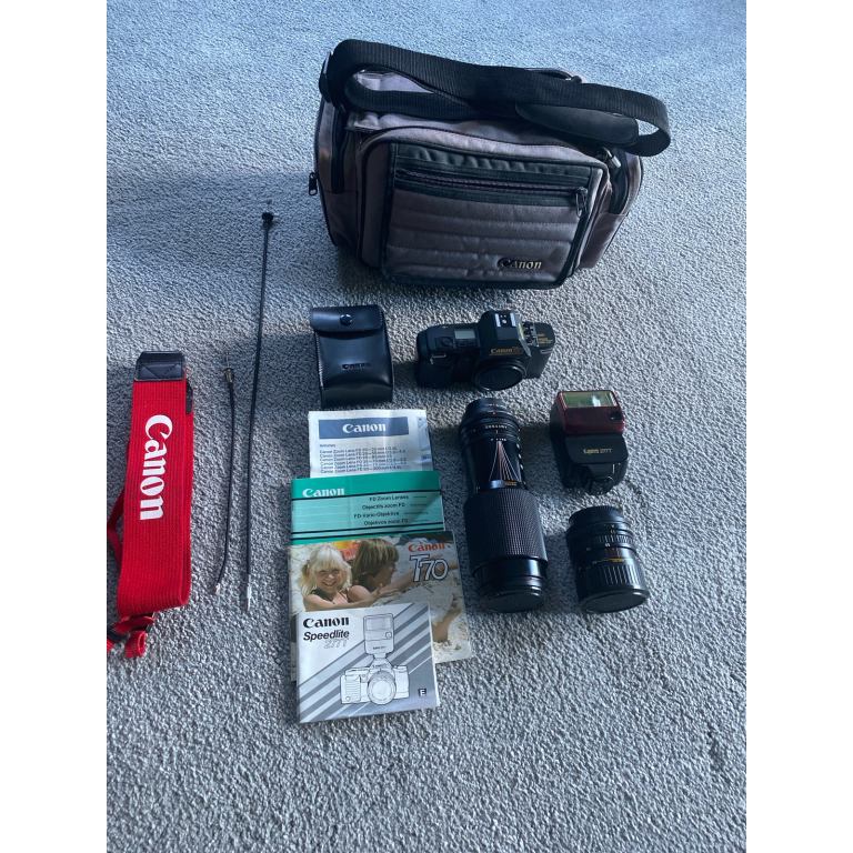 Canon T70 camera, two Canon zoom lenses, Cannon flash, Canon case