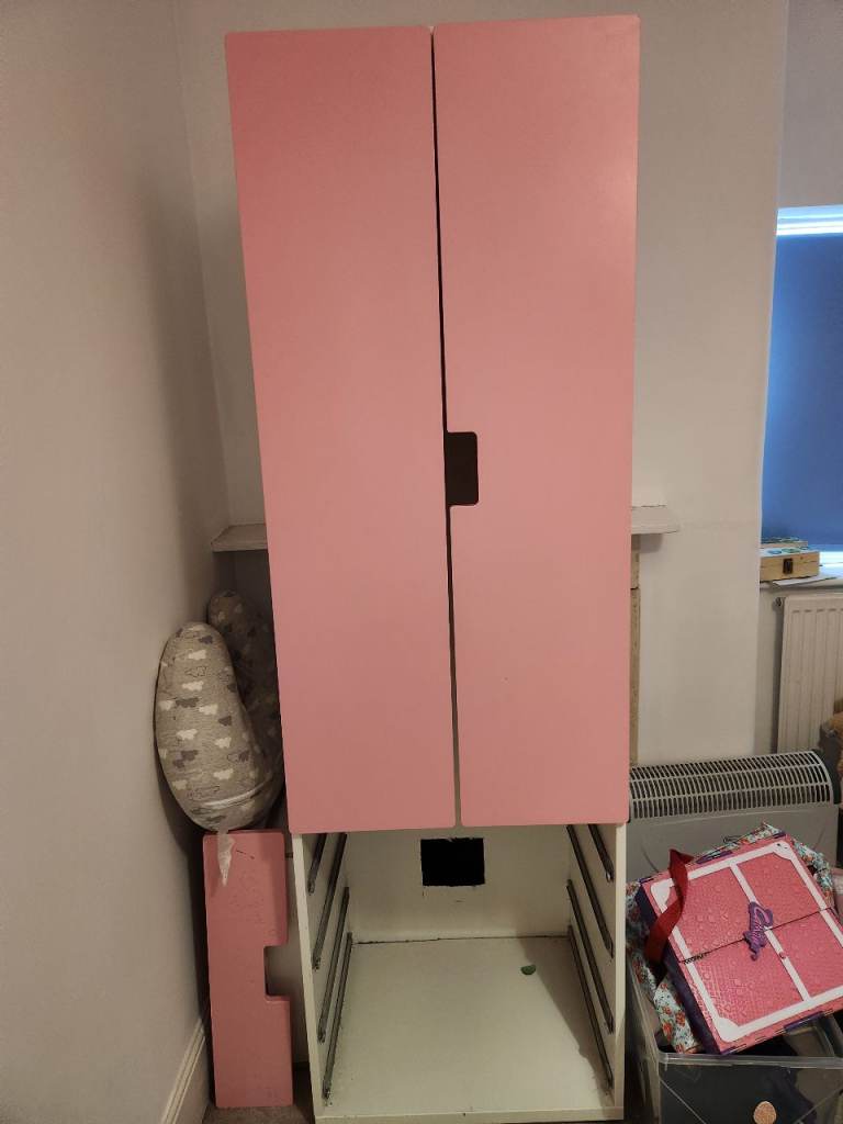 Pink kid's IKEA wardrobe 