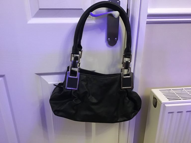 Black handbag with chrome trim 