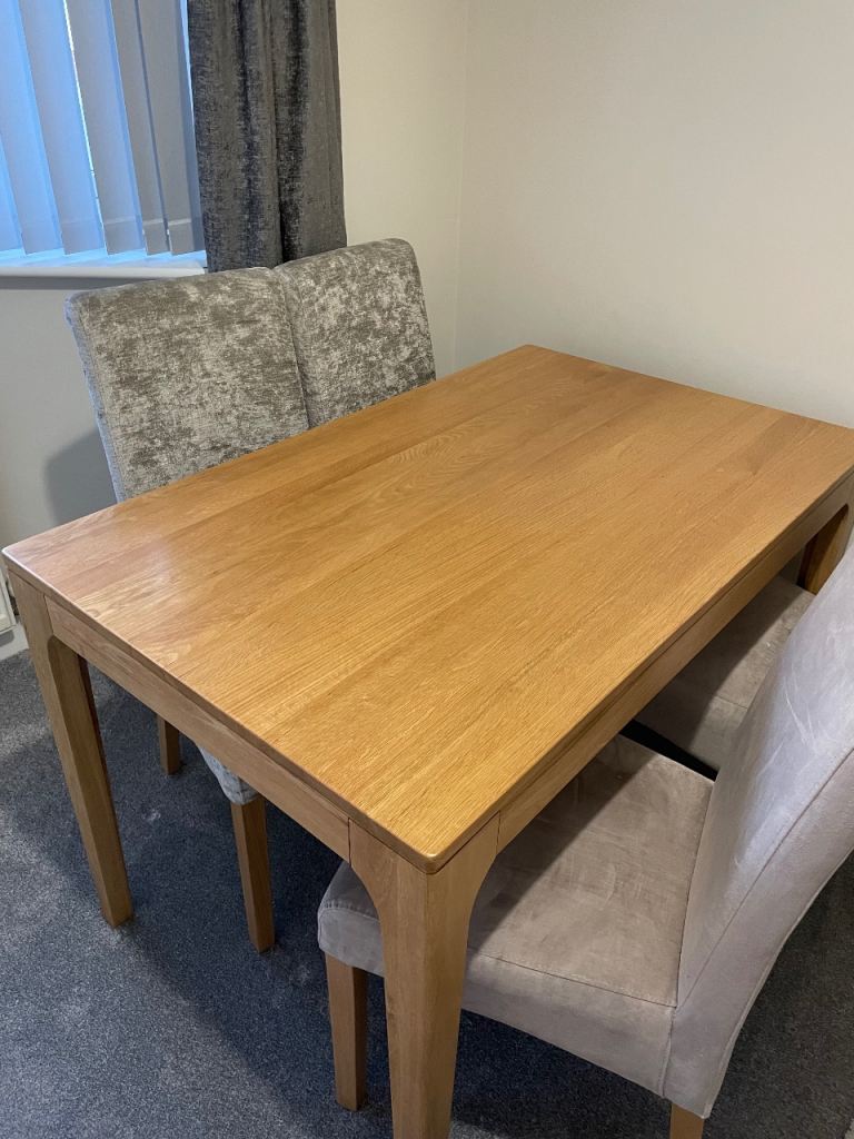 Oaks dining table and faux chairs 