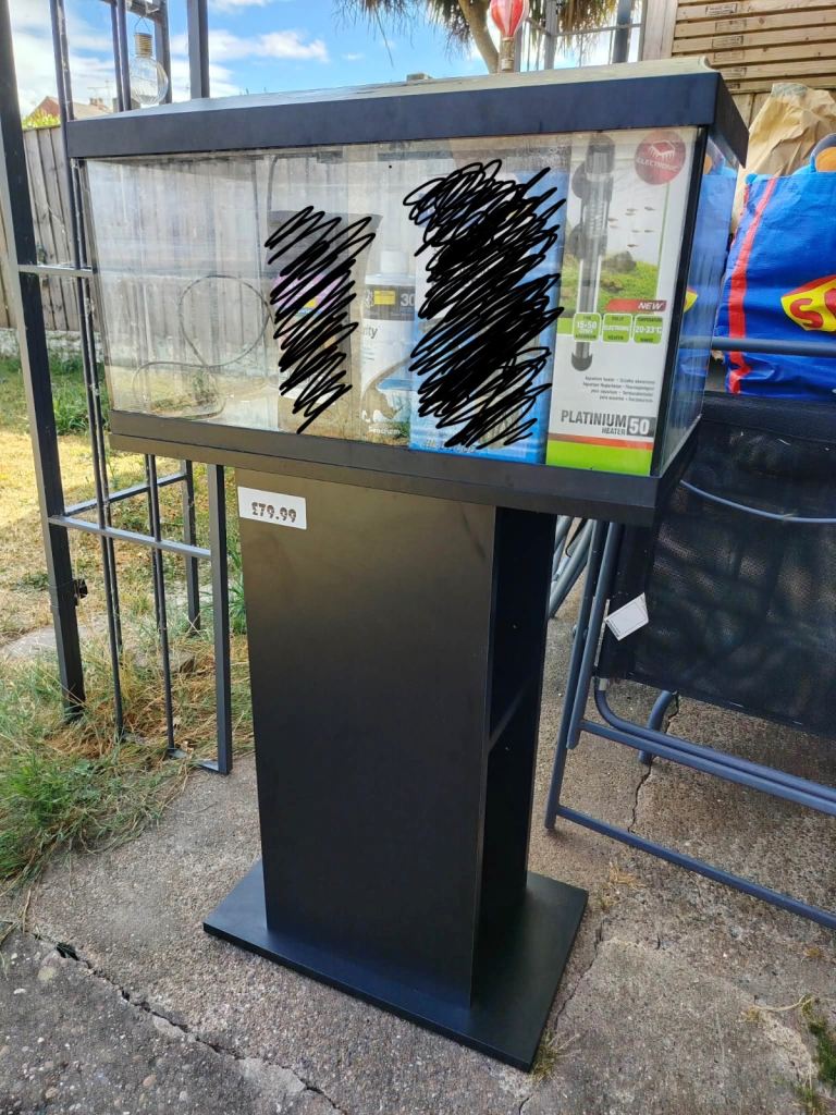Almost New Fish Tank and Stand with Seachem + heater
