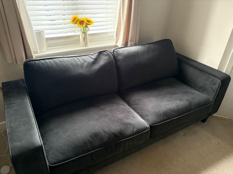 Comfortable Black Three-Seater Sofa – Good Condition