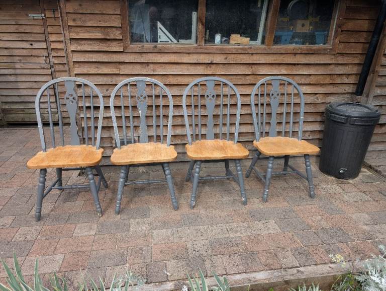 Four solid wood country kitchen chairs. 