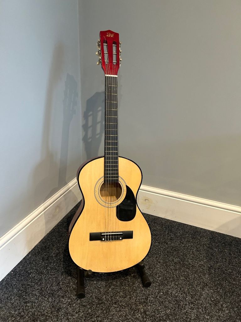 Small acoustic guitar - well used 