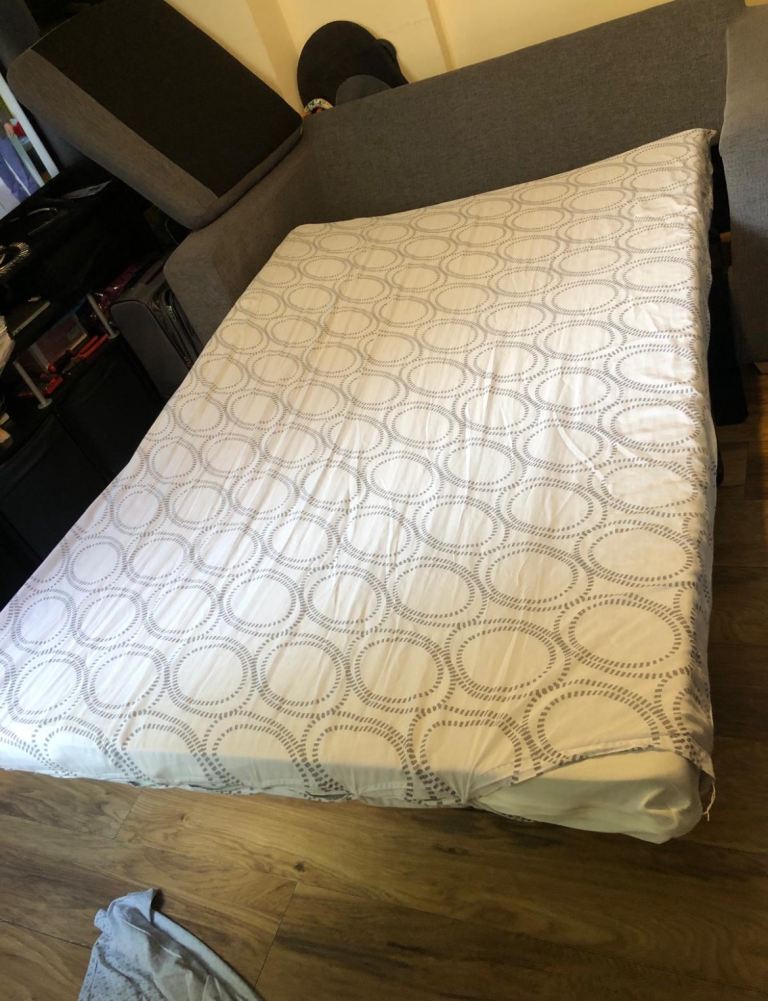 Grey 2-Seater Sofa Bed – Good Condition – Comfortable & Practical