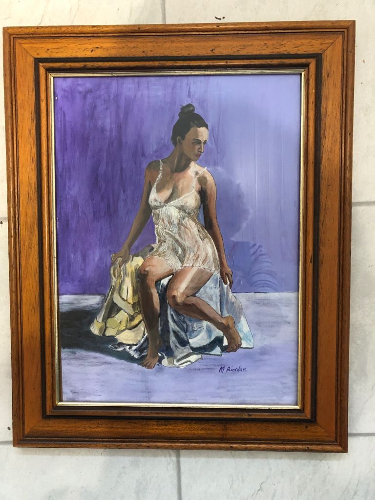 Painting seated woman
