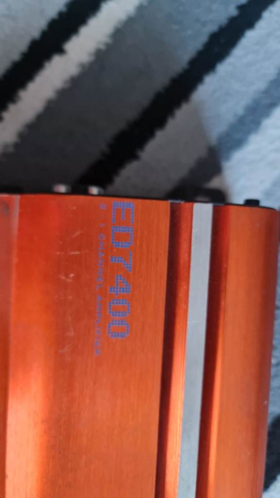 Edge twin sub box with subs. And 400w amp. No wires included