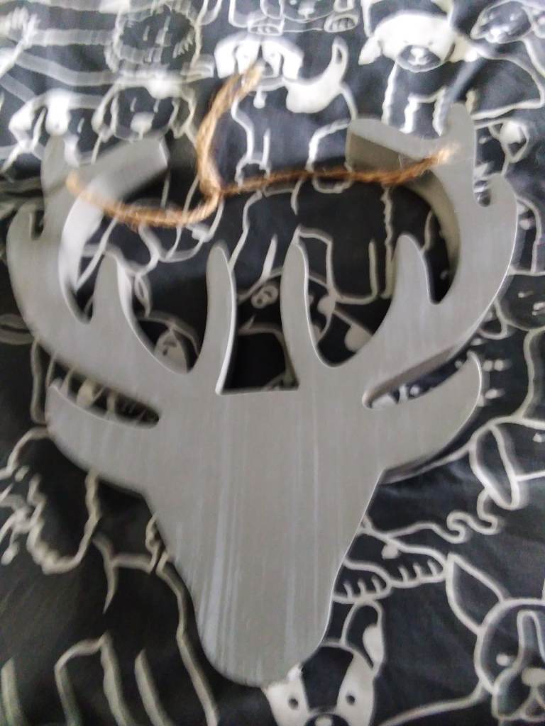 Wooden stag head