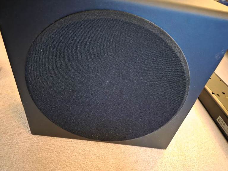 Samsung HW-Q950A soundbar with rear speakers and subwoofer