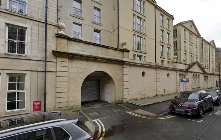 Private parking space in enclosed, underground parking lot in Tollcross– available April