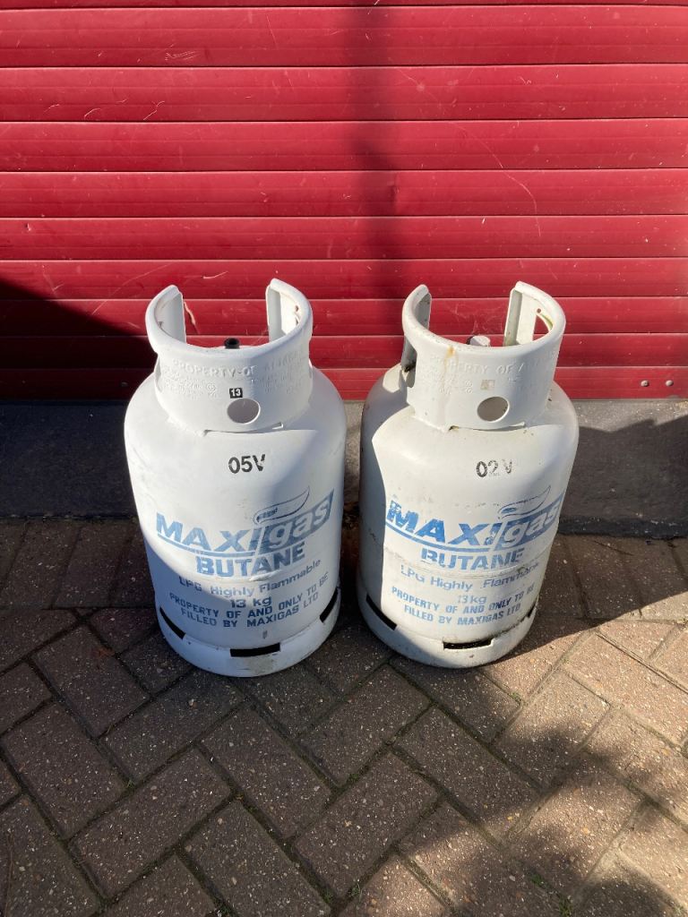 2 x empty gas bottles 