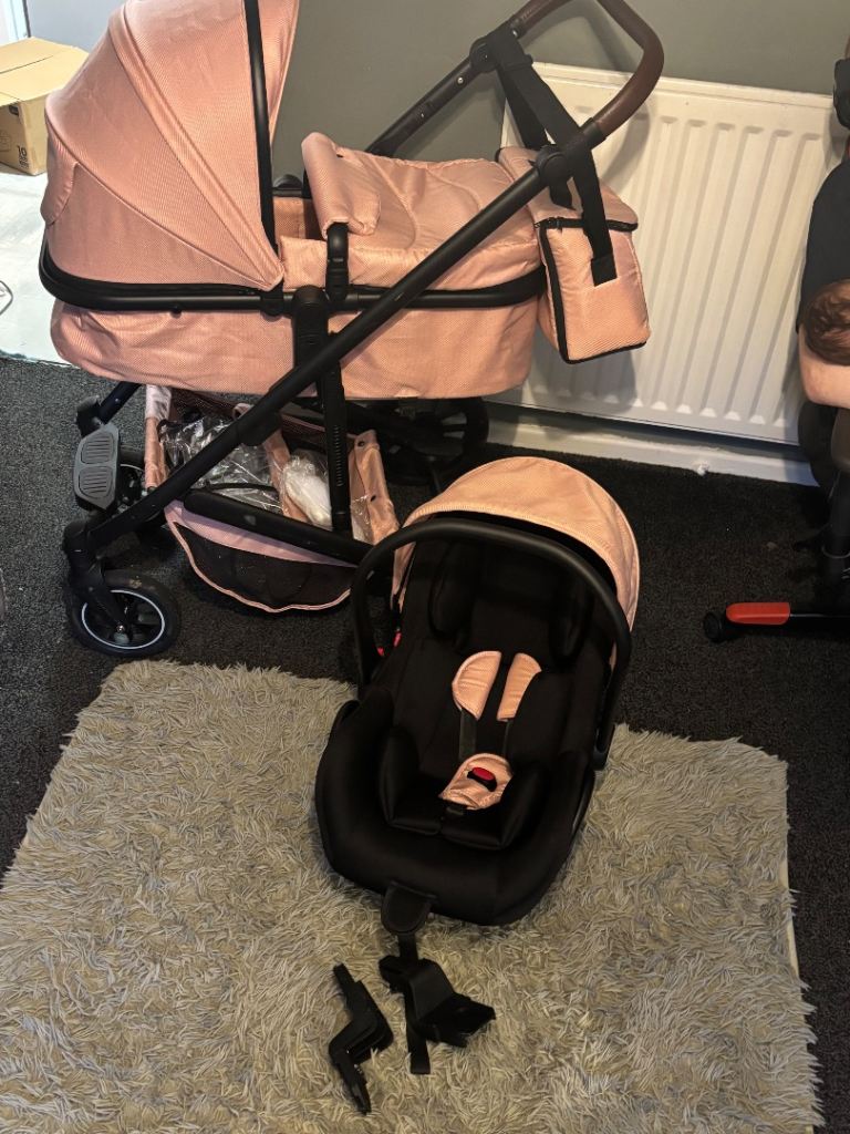 Pink travel system with accessories 