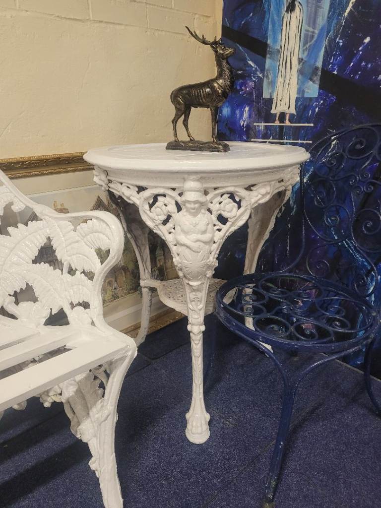 Victorian cast iron pub table Britannia pattern with cast iron garden chair   