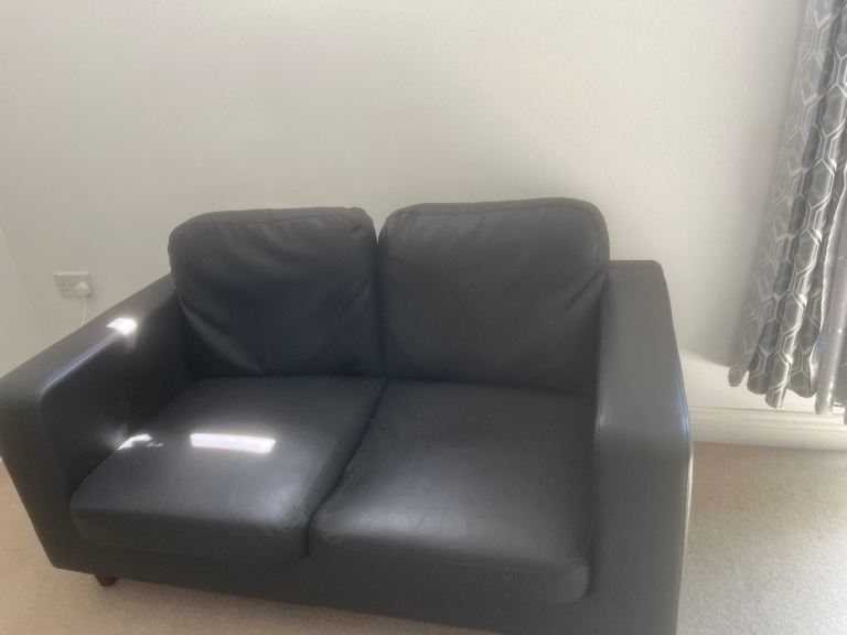 Compact Black Two-Seater Sofa – Good Condition