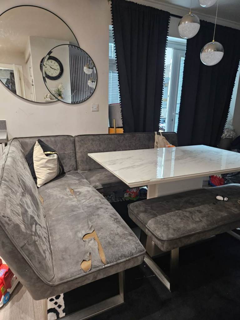 Table with corner chair, sofa and bench