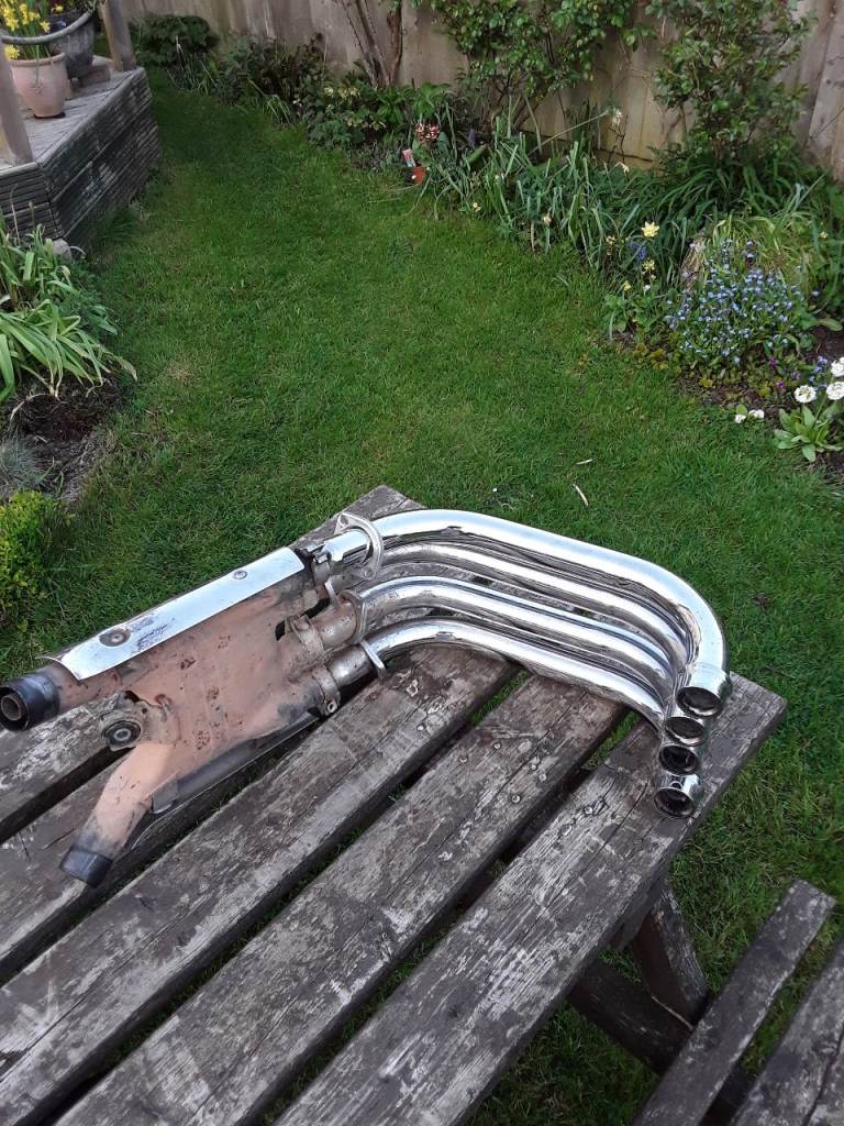 Kawasaki exhaust parts. Four cylinder from the 1980s