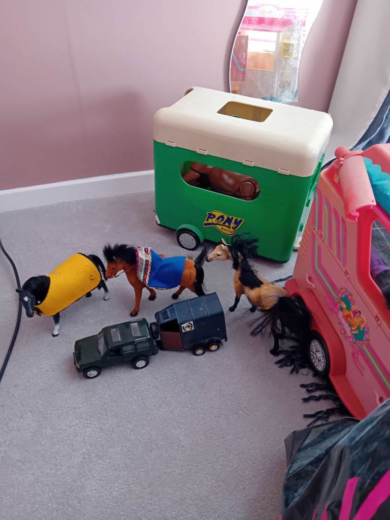 Toy horses and horse boxes