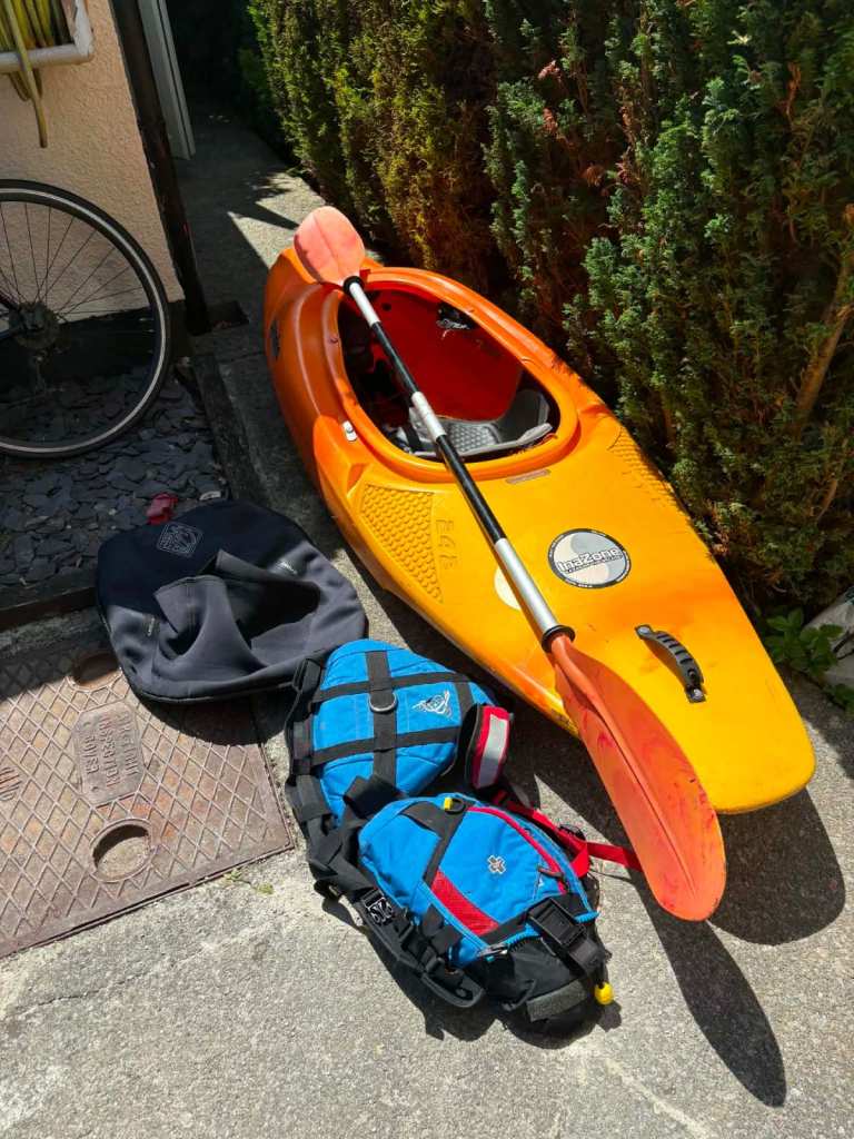 Orange Kayak with Paddle and Buoyancy Aids – Good Condition