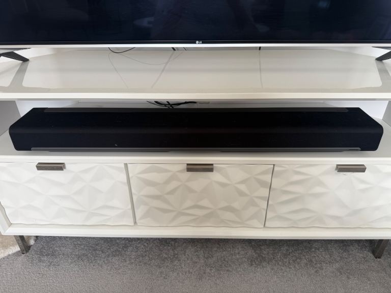 Sonos Playbar, and Two Play 1s with Stands