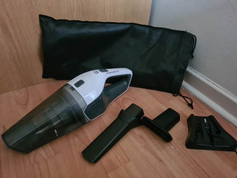 HANDHELD VACUUM CLEANER - GREAT FOR CARS/SMALL ROOMS