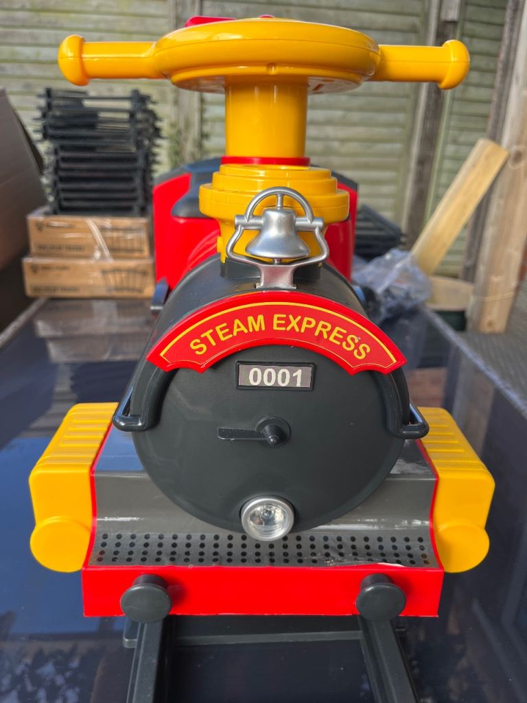 Toddlers ride on train