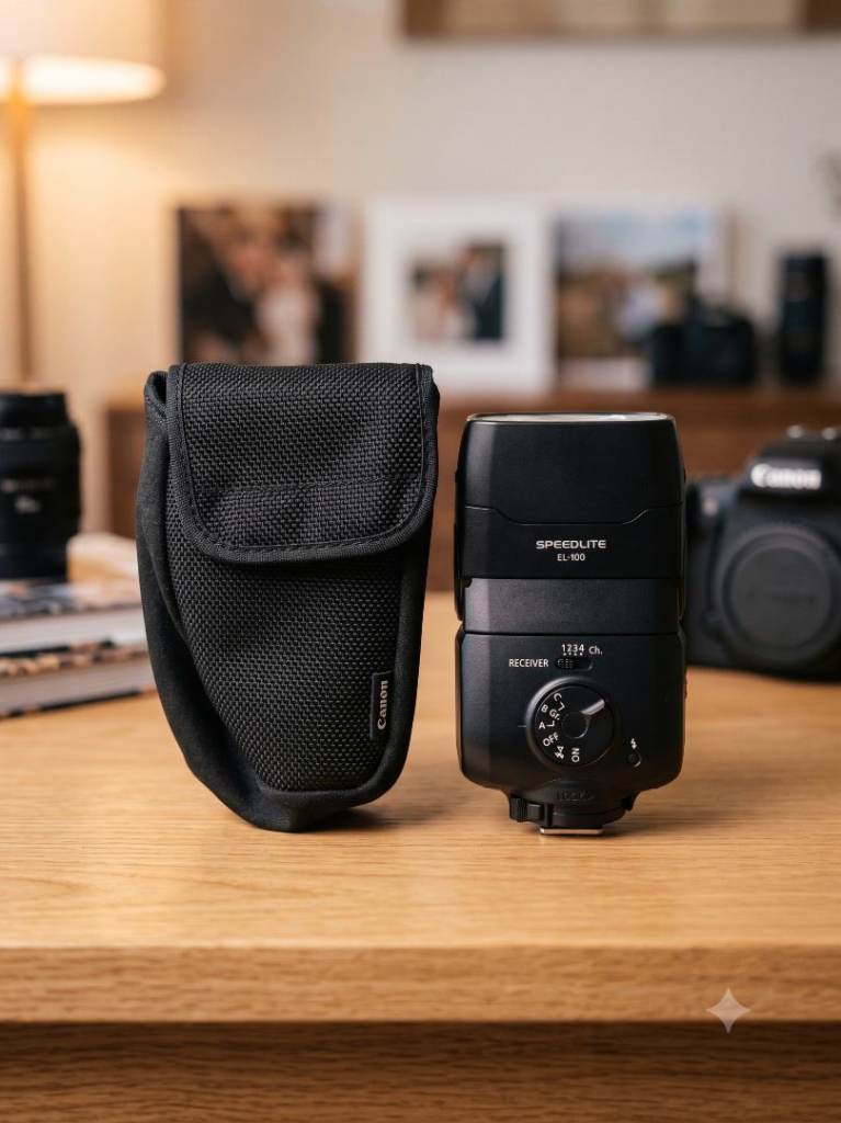 Canon Speedlite EL-100 Camera Flash – As New / Unused with Soft Case