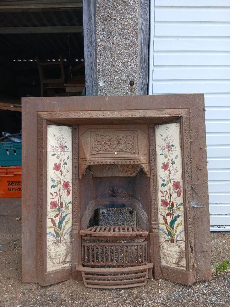 Vintage Cast Iron Fireplace Insert with Decorative Tiles