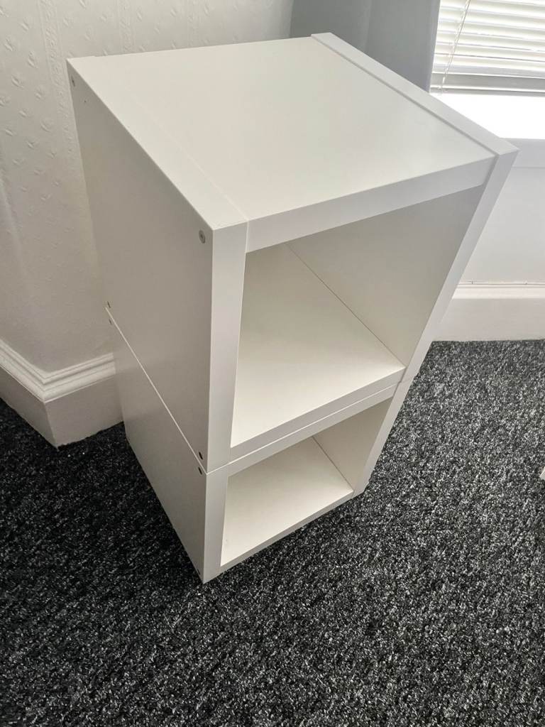 2 white IKEA storage units