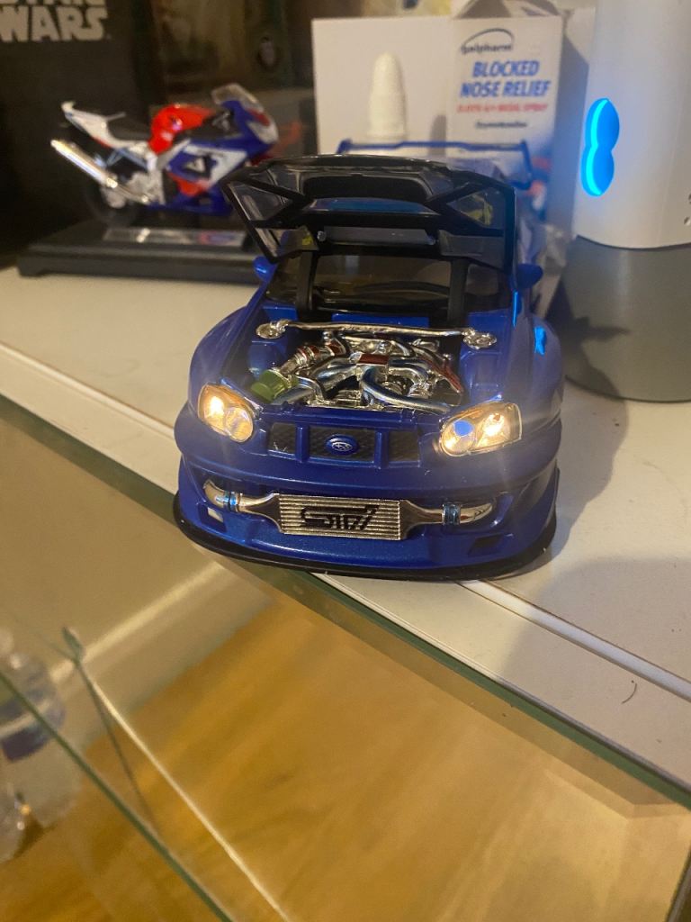 Model cars hot wheels and and rare Subaru STI and a drone  