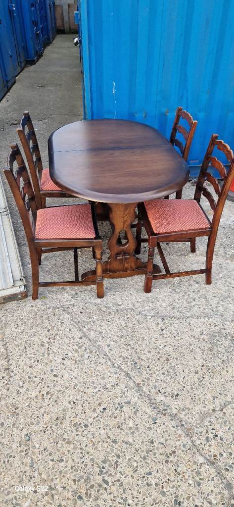 Extending dining table and 4 chairs