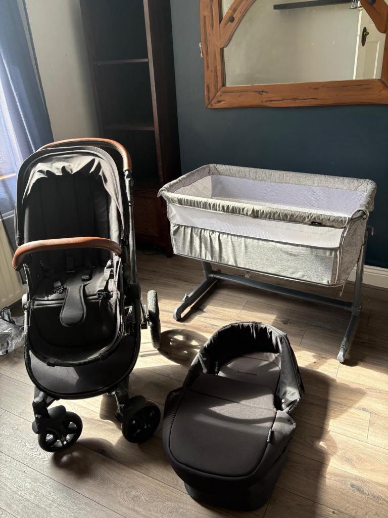 Baby pram and next to me crib 